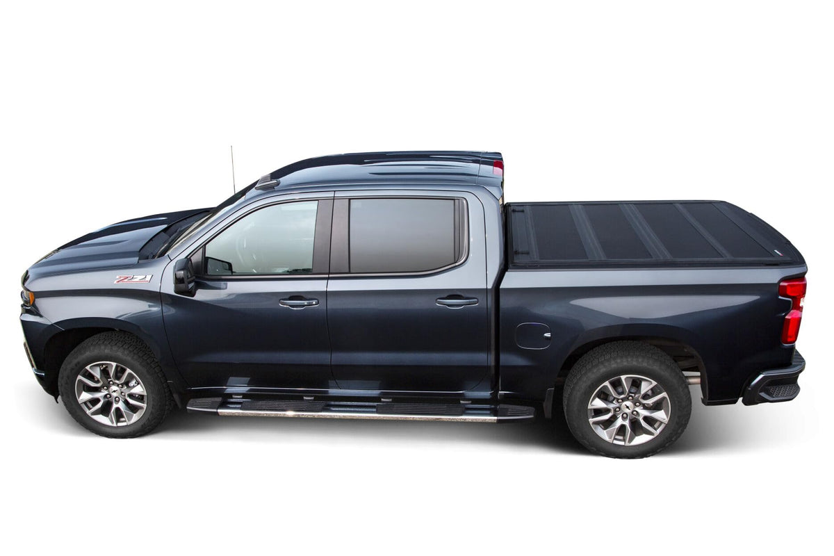 LEER 631137 LEER HF350M Tri-Folding Truck Bed Tonneau Cover, Fits Dodge Ram 1500 Crew Cab and Ram Classic, Years 2009-2018 and 2019, 5'7" Truck Bed, Black