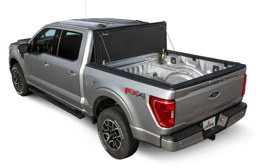 LEER 631286 LEER HF350M Tri-Folding Truck Bed Tonneau Cover, Fits Toyota Tacoma Double Cab with Deck Rail System, Years 2016-2023, 5'2" Truck Bed, Black
